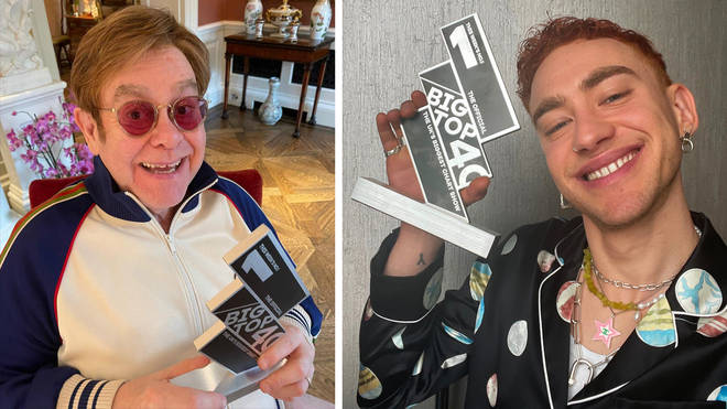 Sir Elton John and Olly Alexander posing with their Official Big Top 40 Number 1 trophies