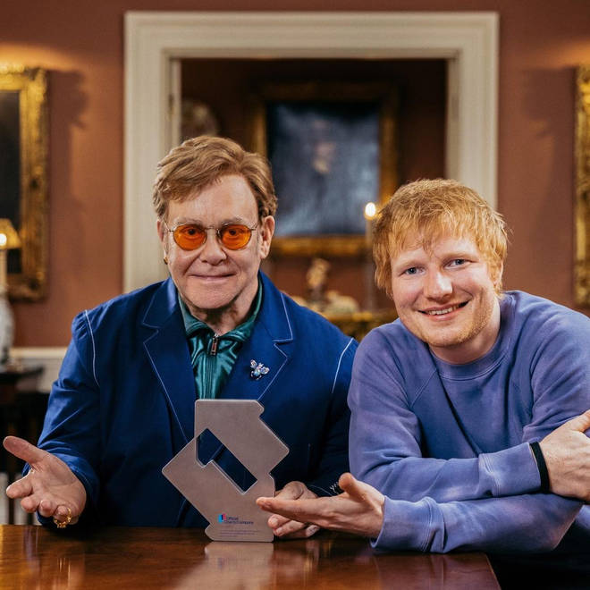 Ed Sheeran & Elton John pose with their Number 1 trophy!