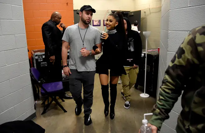 Ariana Grande with her manager Scooter Braun