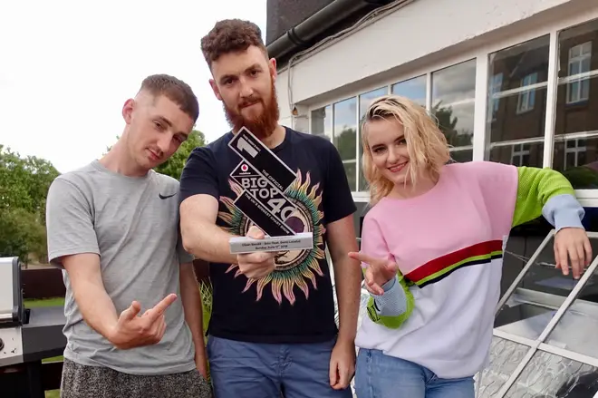 Clean Bandit with the Official Big Top 40 from Global Number 1 trophy